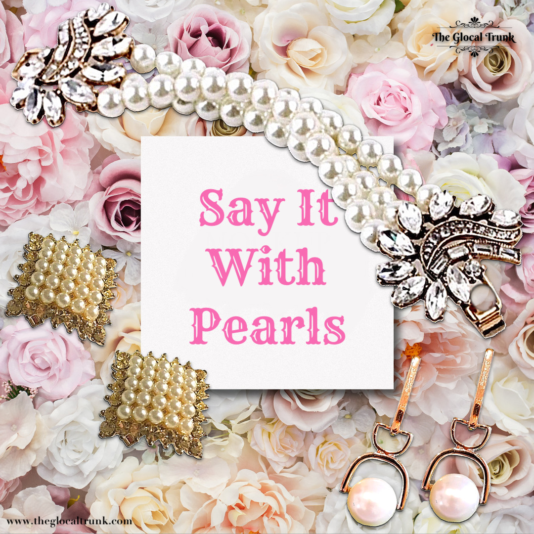 SAY IT WITH PEARLS